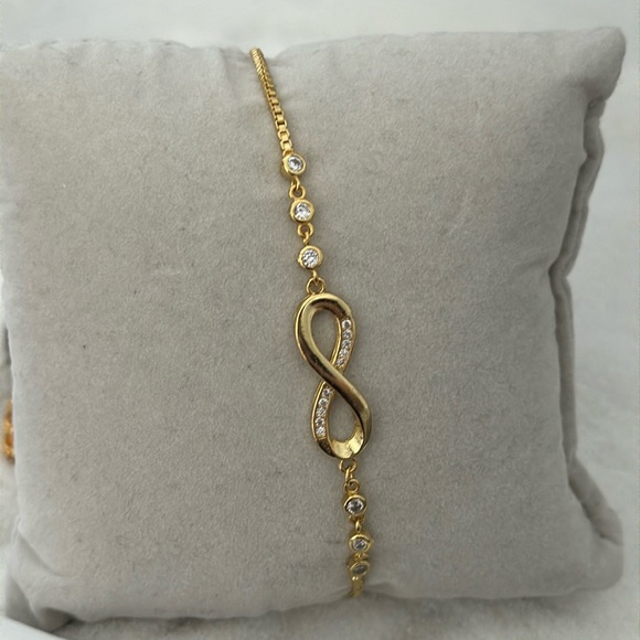 Gold Adjustable Bracelet with Crystals and Infinity Symbol - Picture 1 of 6